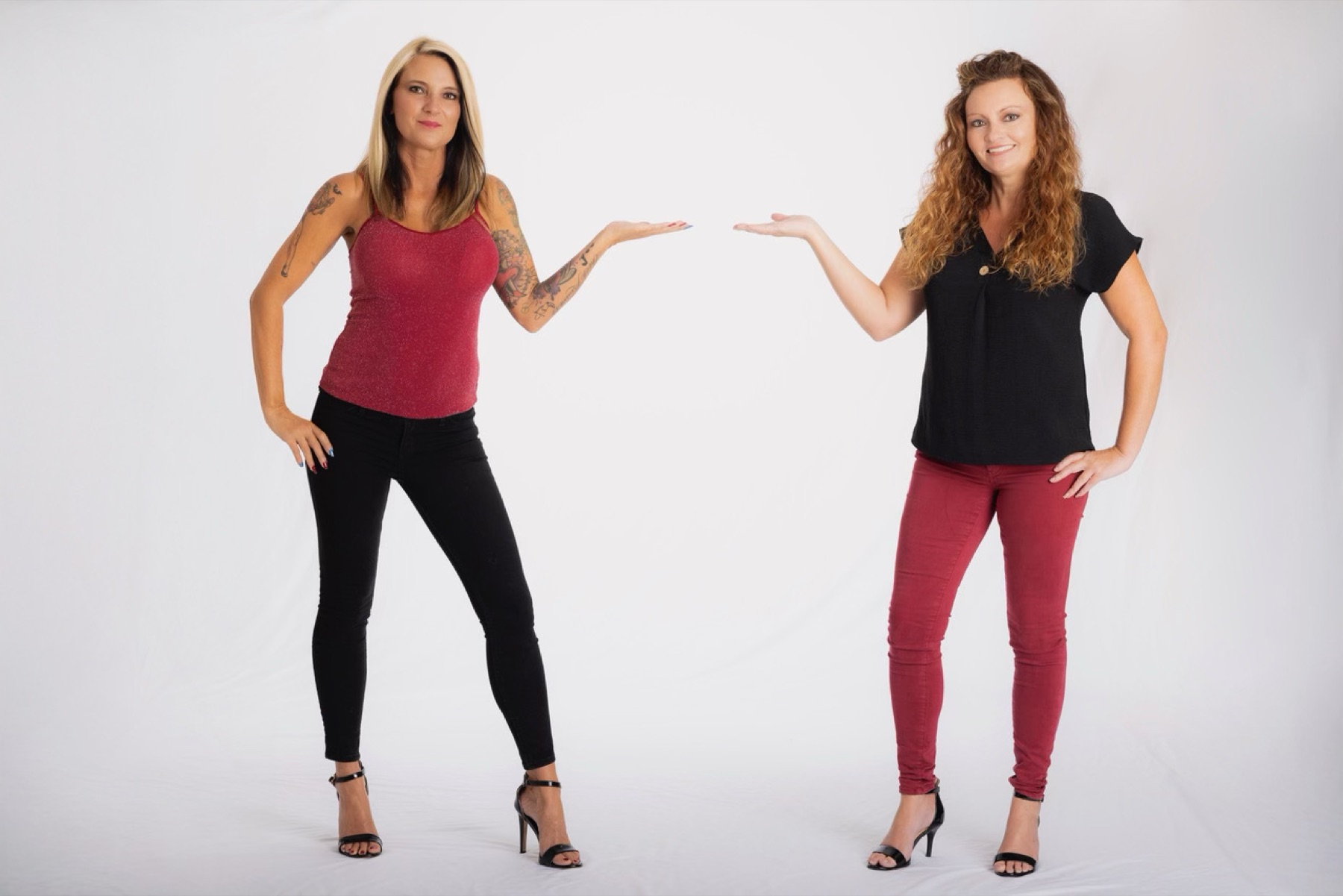 The Sold Sisters presenting together against a studio backdrop